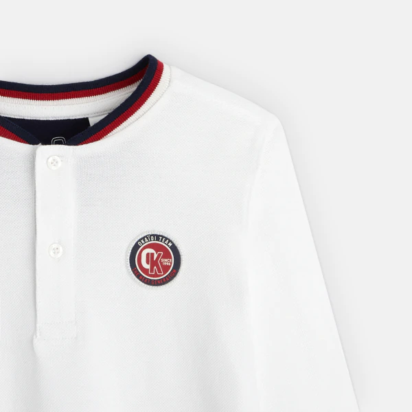 Long-sleeved t-shirt with an emblem