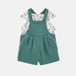 Pleated overalls and floral blouse