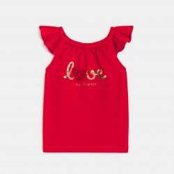 Baby girlu2019s shiny red T-shirt with a message