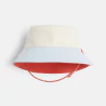 Baby boy's reversible printed orange bucket hat.
