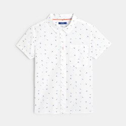 Boy's short-sleeve palm tree motif shirt.