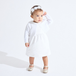 Baby girl's short white knitted bolero cardigan